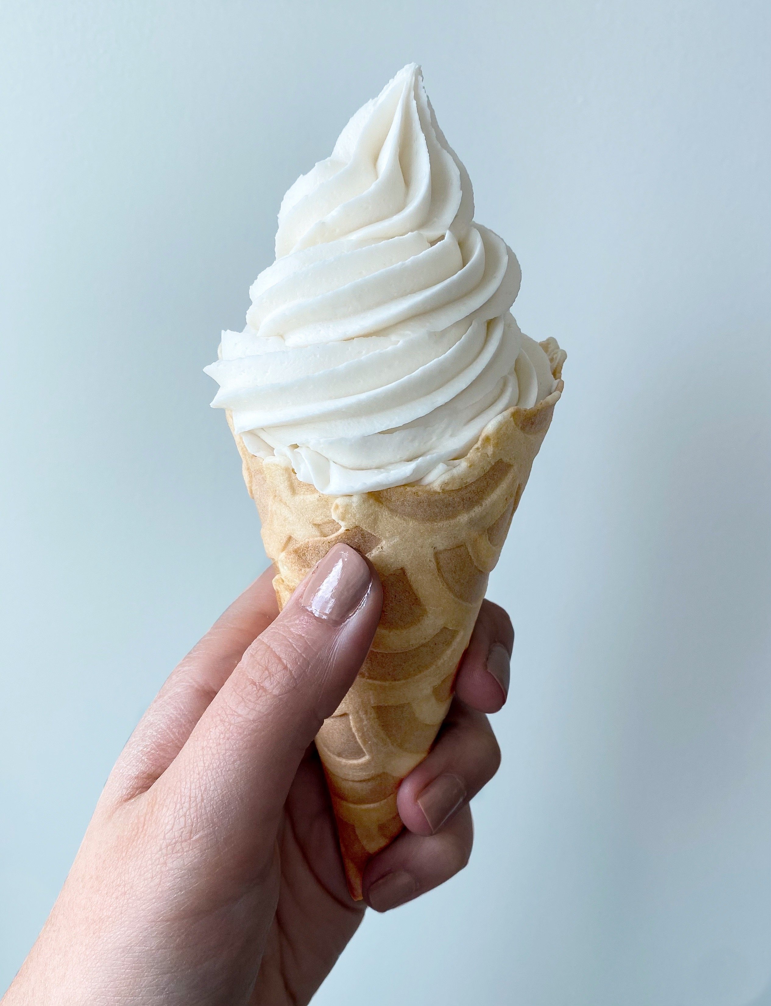 vanilla soft serve ice cream in a cup