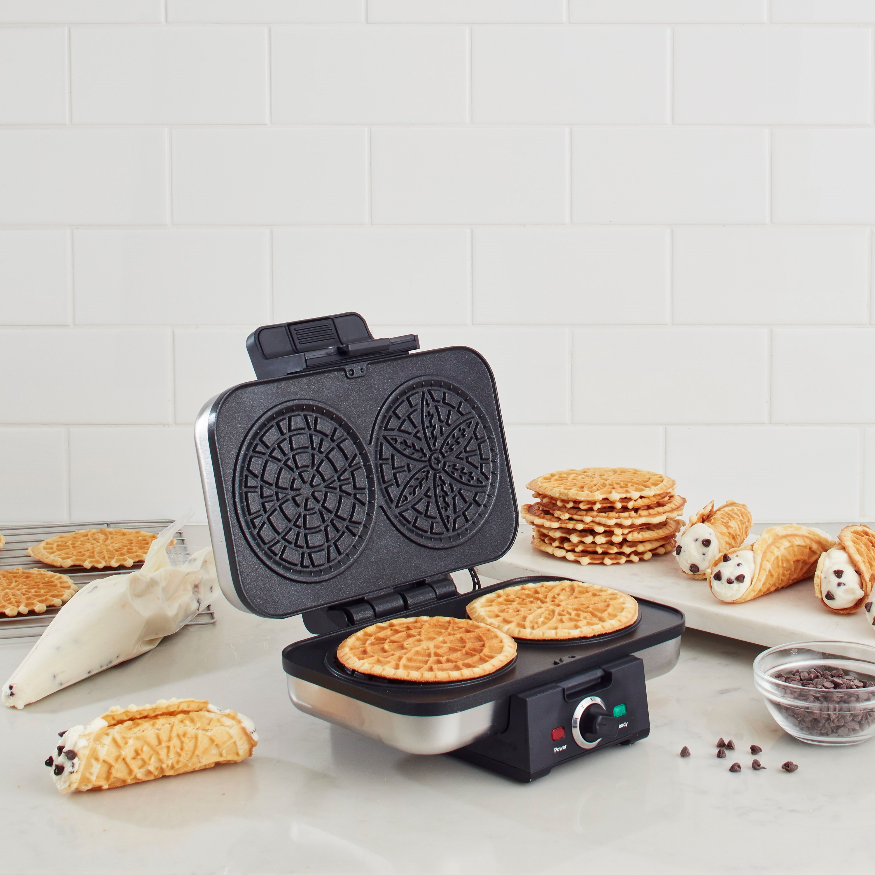 I could use an electric pizzelle iron, but this is my idea of a